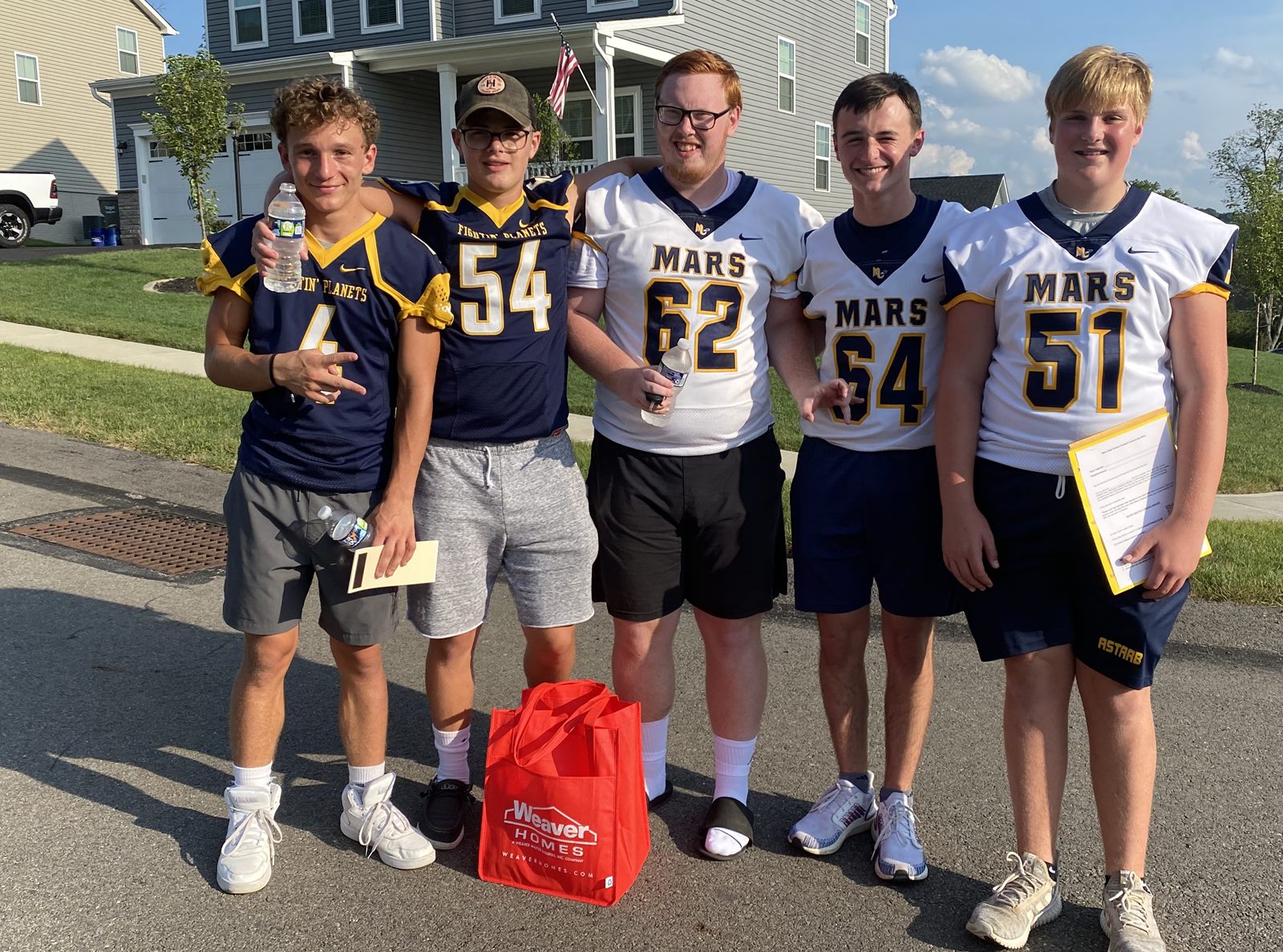 Mars Planets players in jerseys at the Community Drive