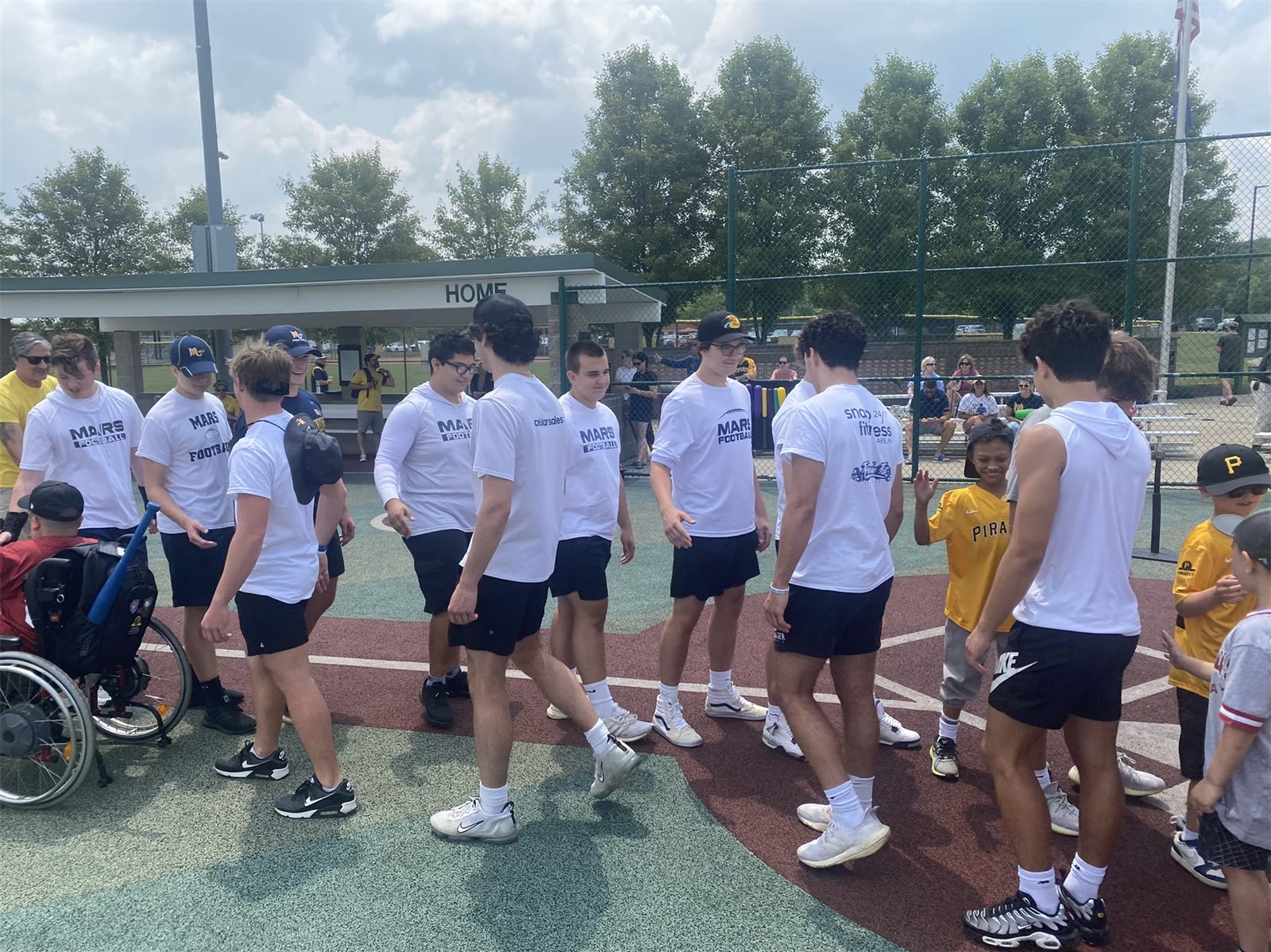 Mars football players at the Miracle League Field