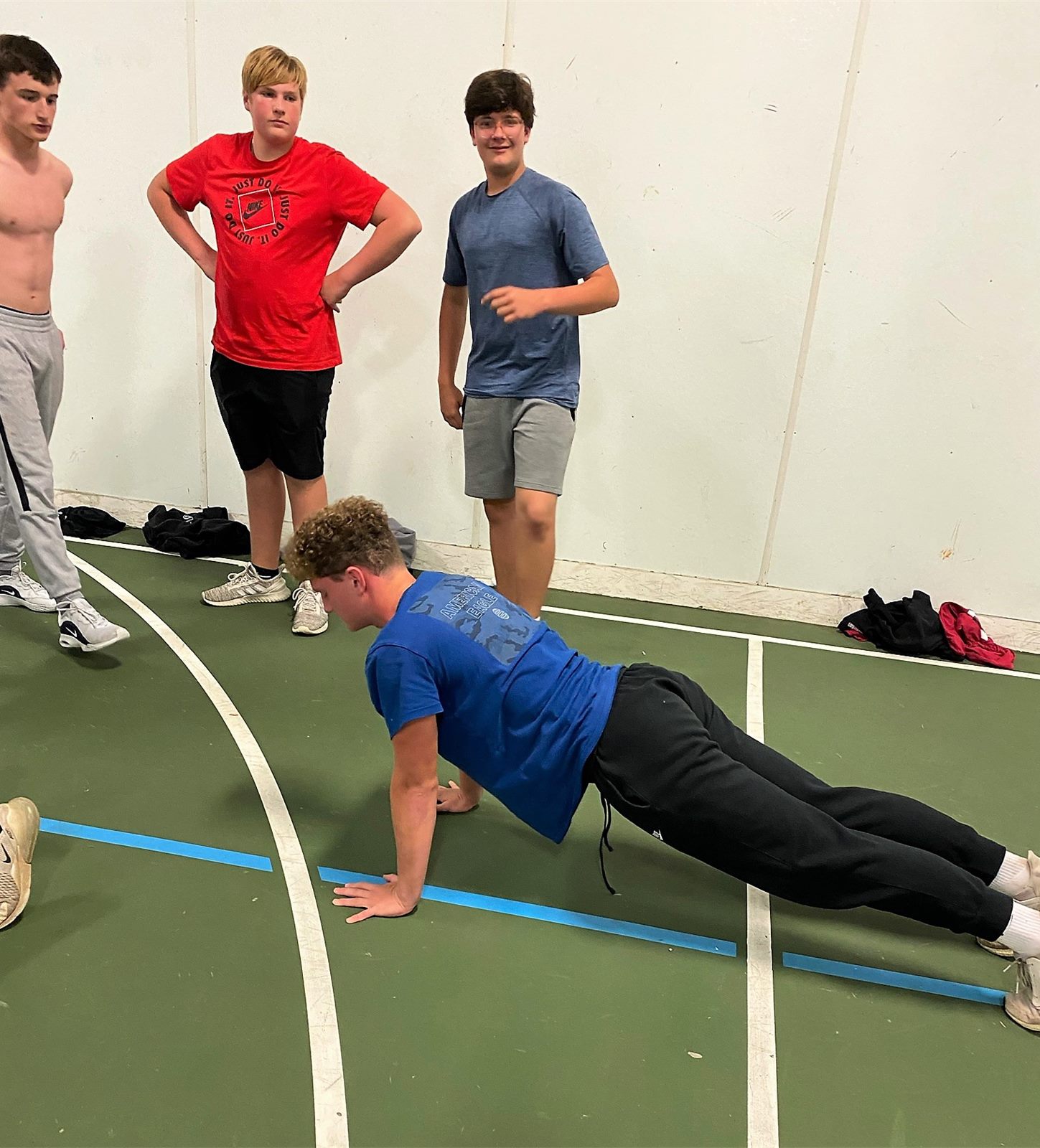 Players doing push ups at the Push Up Challenge